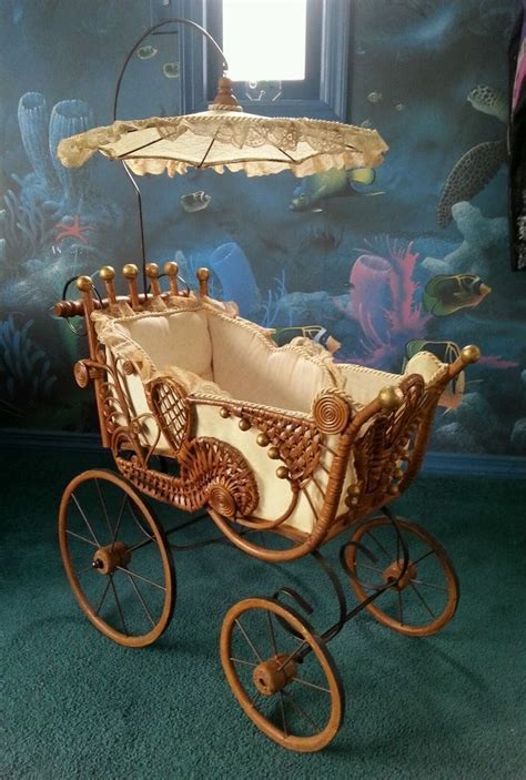 antique baby carriage dolls